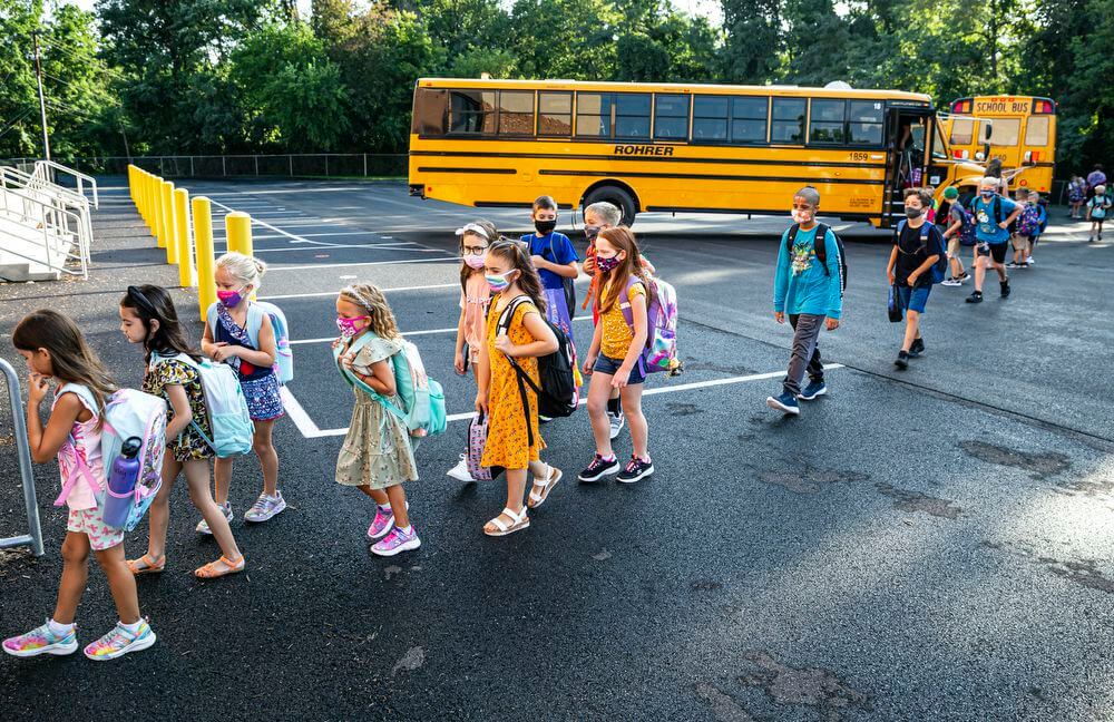 From The Bus Stop To After-School Activities, Here's How Kids Can Help Stay Safe During This Delta Variant Surge